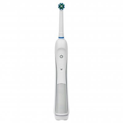 Oral B electric toothbrush standing up right
